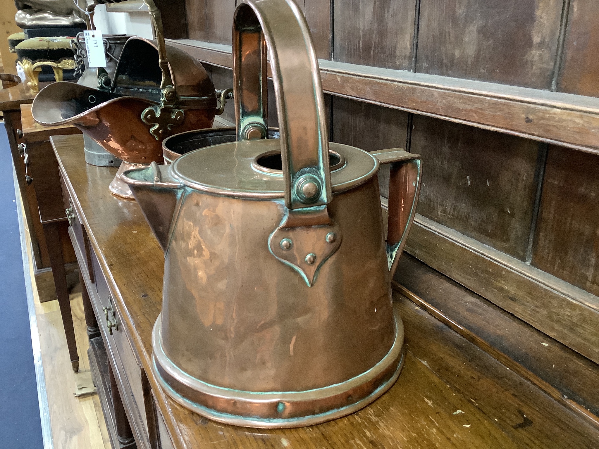 A Victorian copper coal scuttle, milk pail and two others